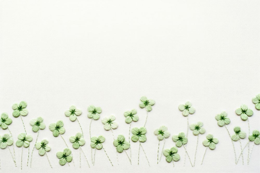 Little Lucky clovers pattern backgrounds embroidery. 