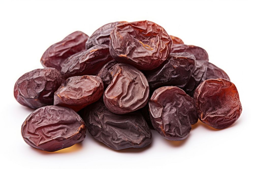 Dried plums food white background freshness. AI generated Image by rawpixel.