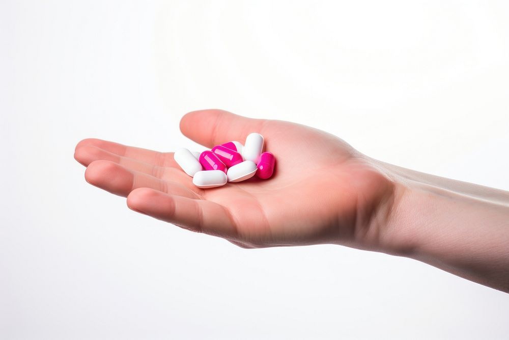 Tablet medicine holding pill hand. AI generated Image by rawpixel.