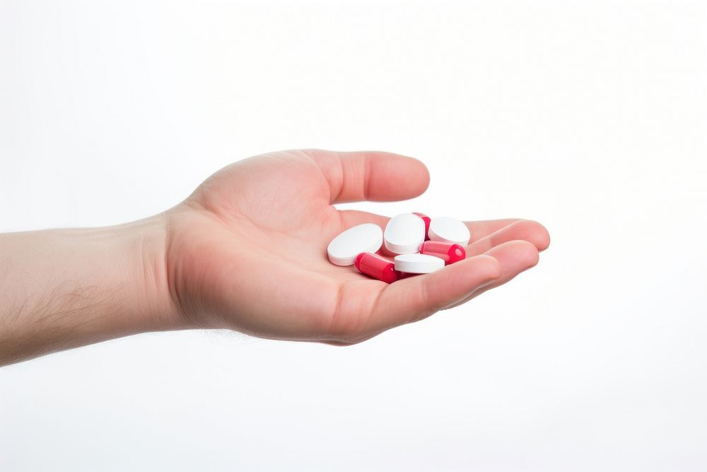 Tablet medicine holding pill hand. AI generated Image by rawpixel.