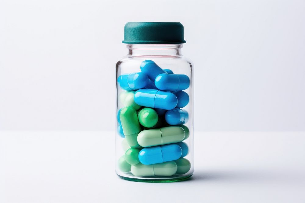 Capsule medicine bottle green pill. AI generated Image by rawpixel.