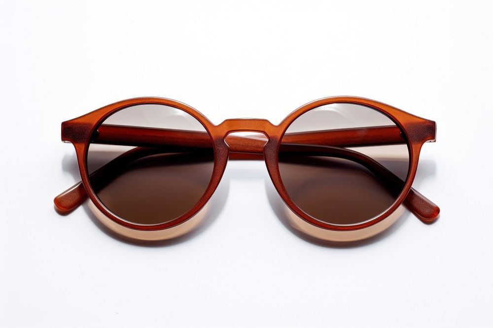 Round brown sunglasses white background accessories accessory. AI generated Image by rawpixel.