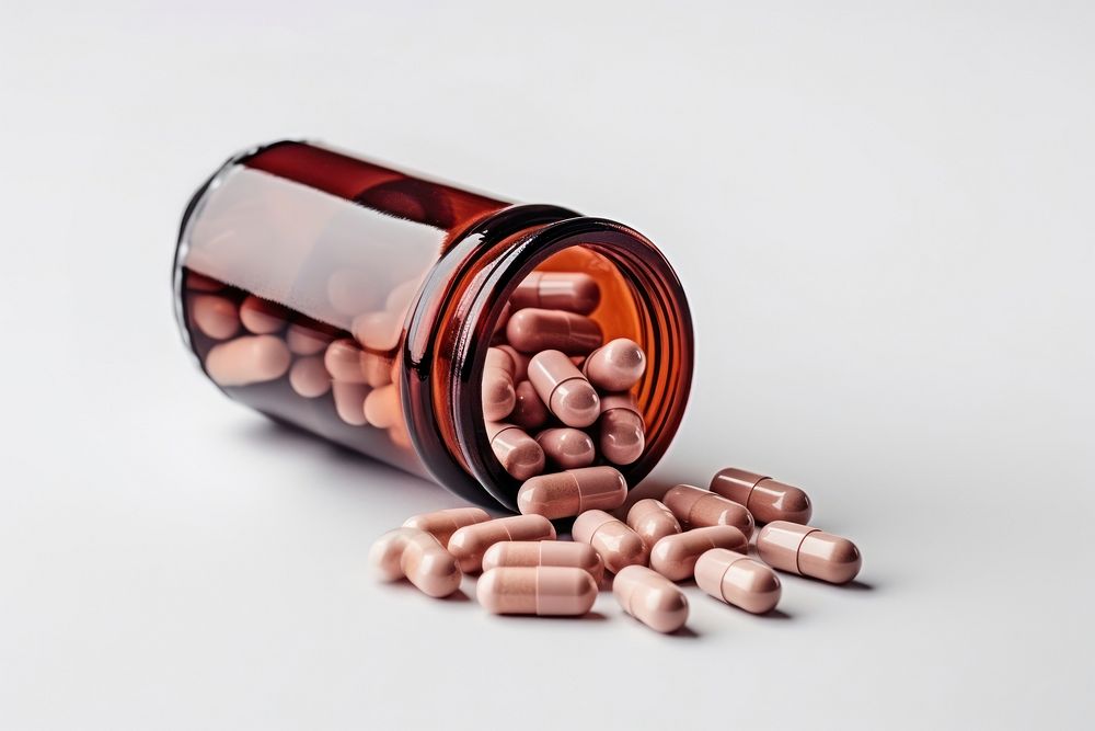Capsule medicine bottle pill white background. AI generated Image by rawpixel.