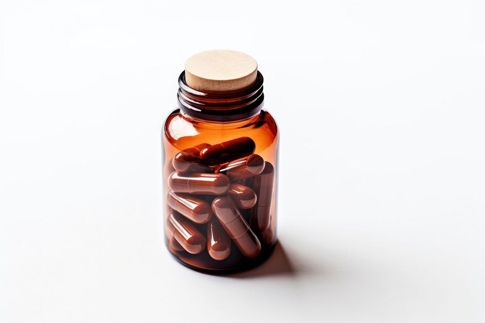 Capsule medicine bottle brown pill. AI generated Image by rawpixel.