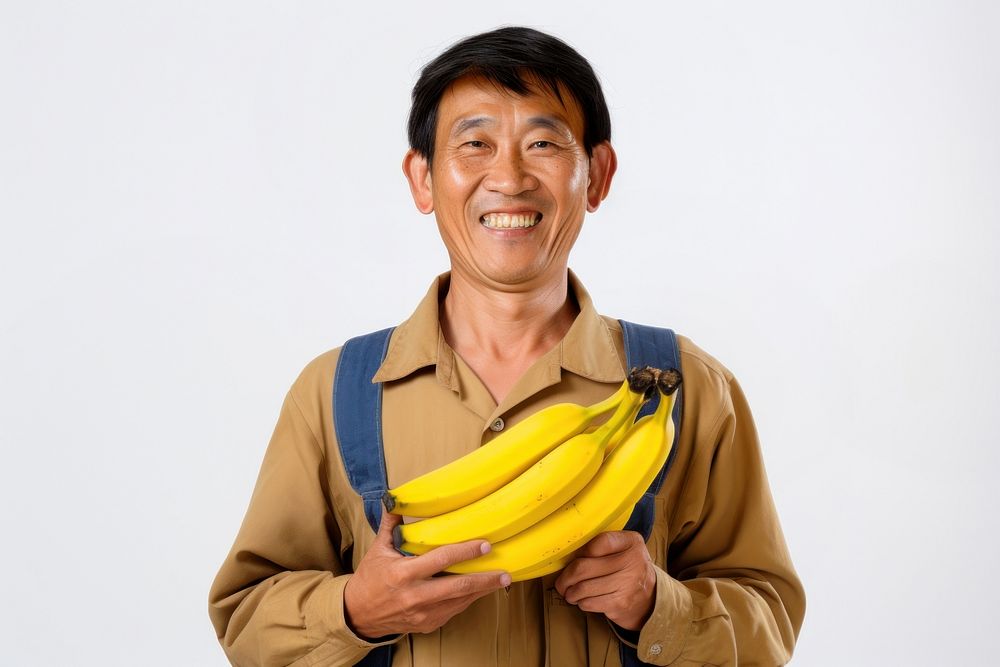 Happy asian farmer banana portrait holding. AI generated Image by rawpixel.