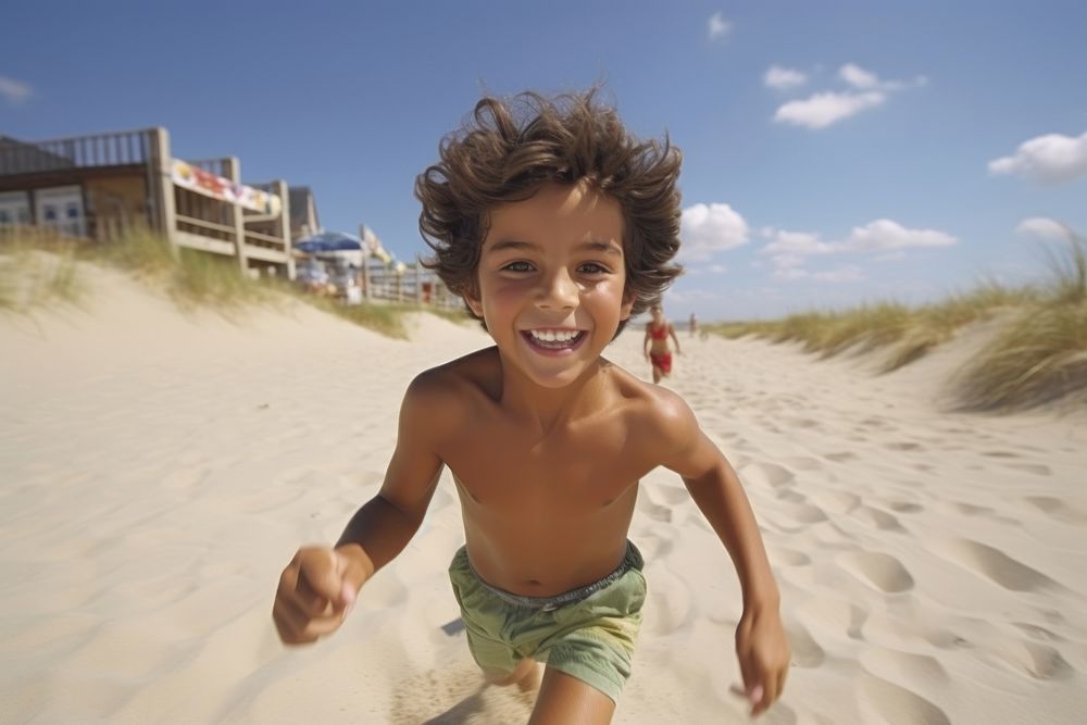 Hispanic boy running on the beach portrait outdoors vacation. AI generated Image by rawpixel.