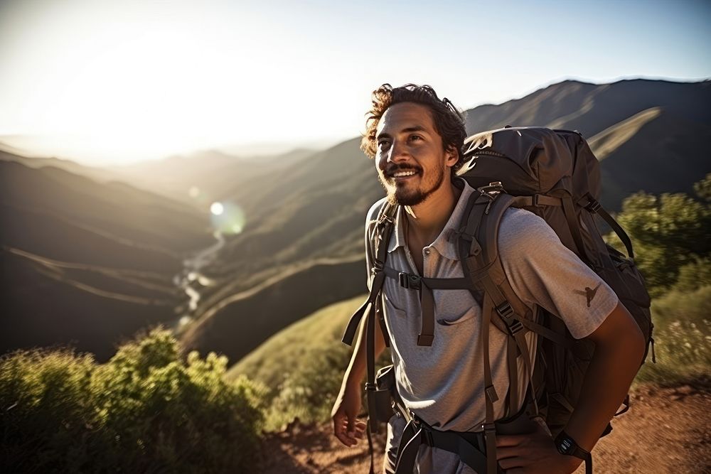 A Latino hiker exploring scenic mountain trails on a summer trek exploration adventure landscape. AI generated Image by…