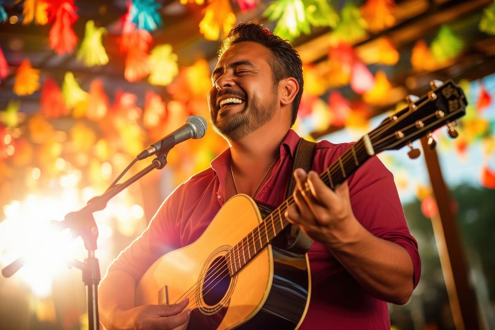 A Latino musician playing guitar at a lively outdoor fiesta celebration microphone adult. AI generated Image by rawpixel.