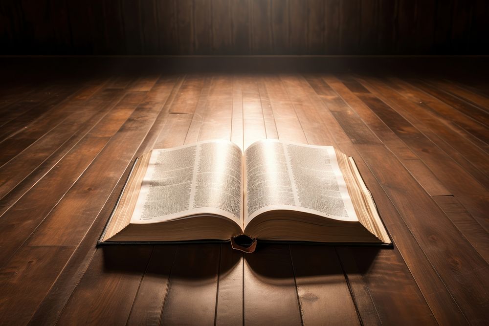 Opened bible book floor wood publication. AI generated Image by rawpixel.
