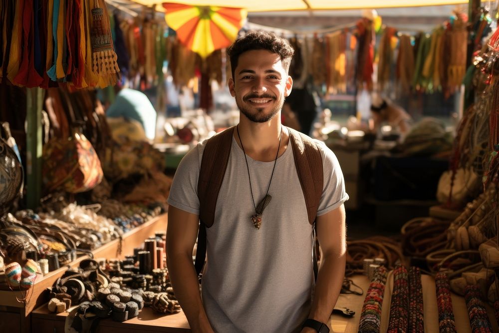A young Latino entrepreneur showcasing handmade crafts at a vibrant street market creativity portrait bazaar. AI generated…