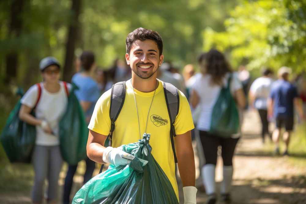 A young Latino environmentalist leading a community cleanup campaign outdoors adult head. AI generated Image by rawpixel.