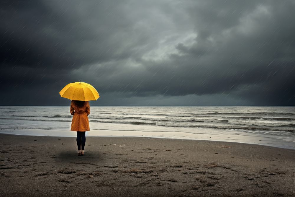 Beach rainy day outdoors walking nature. AI generated Image by rawpixel.