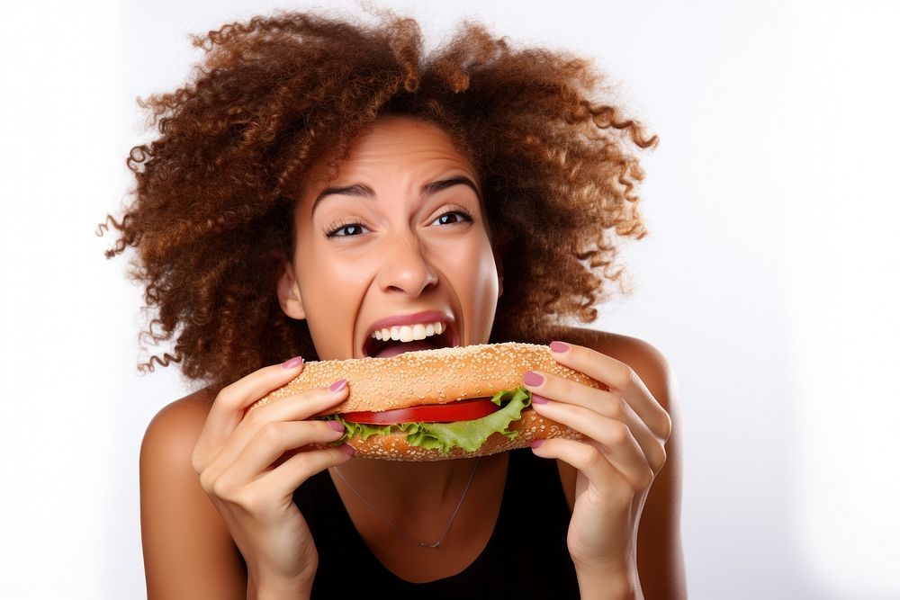 Girl biting sandwich eating. AI generated Image by rawpixel.