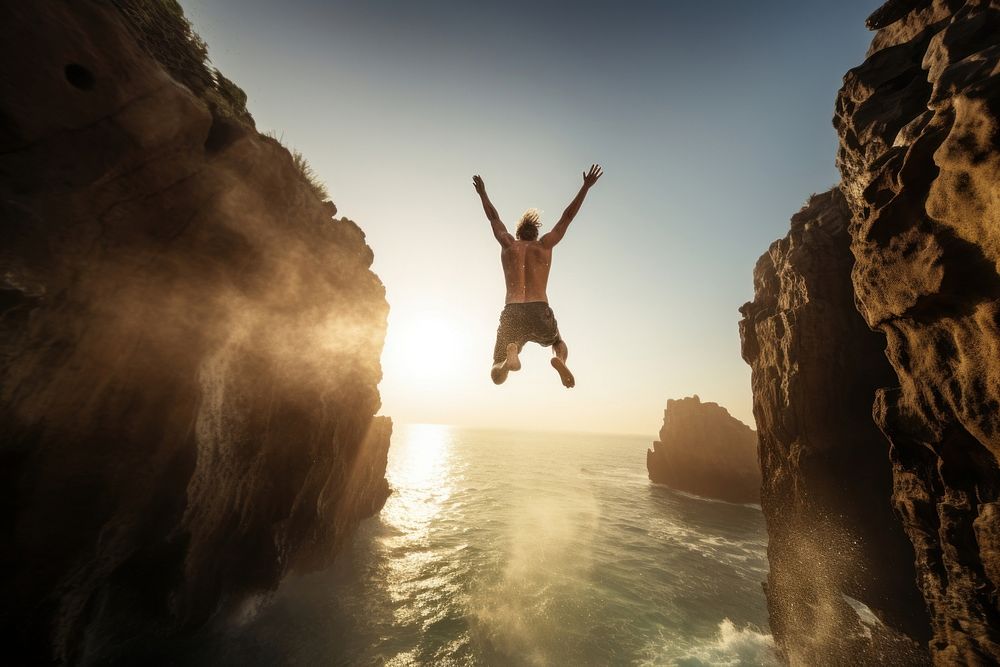 Cliff diving outdoors nature rock. AI generated Image by rawpixel.
