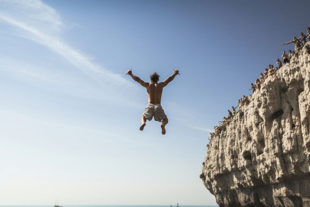 Cliff diving outdoors nature beach. AI generated Image by rawpixel.