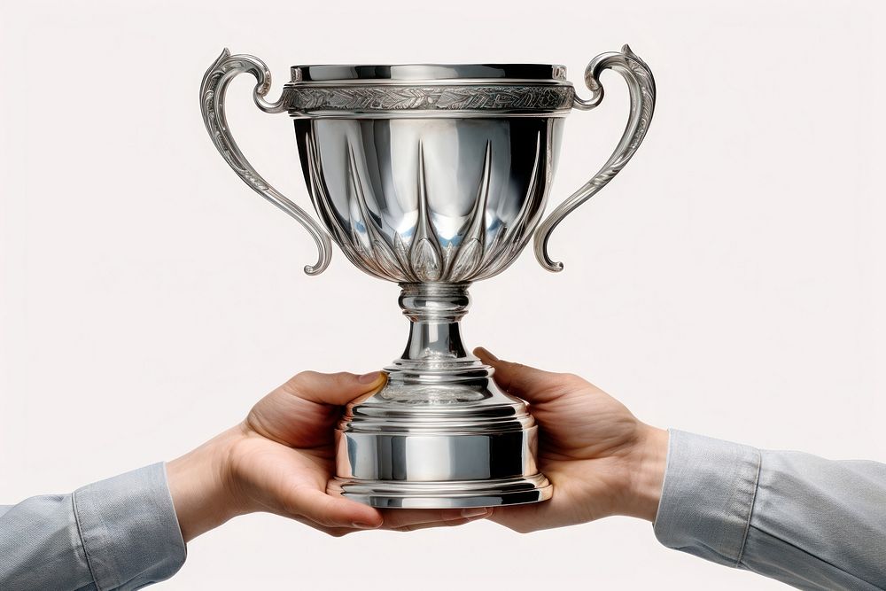 Silver trophy holding hand achievement. AI generated Image by rawpixel.