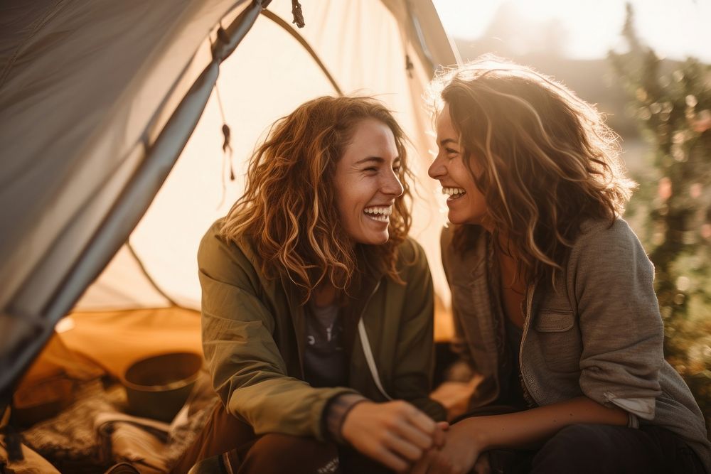 In camping tent laughing outdoors smile. AI generated Image by rawpixel.