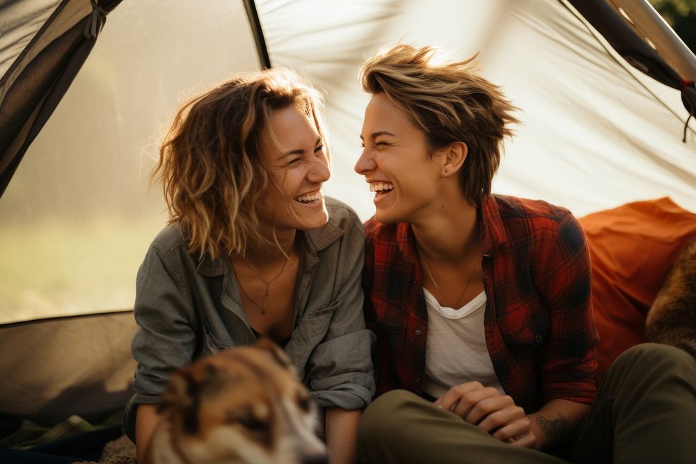 In camping tent laughing outdoors adult. 