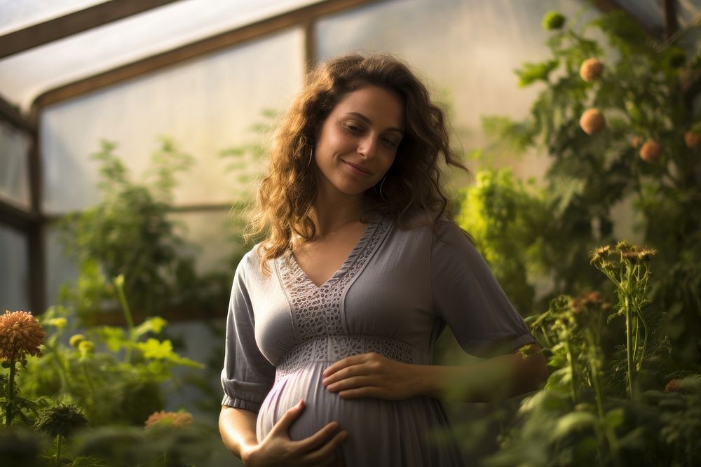 Israeli pregnant woman garden gardening portrait. AI generated Image by rawpixel.