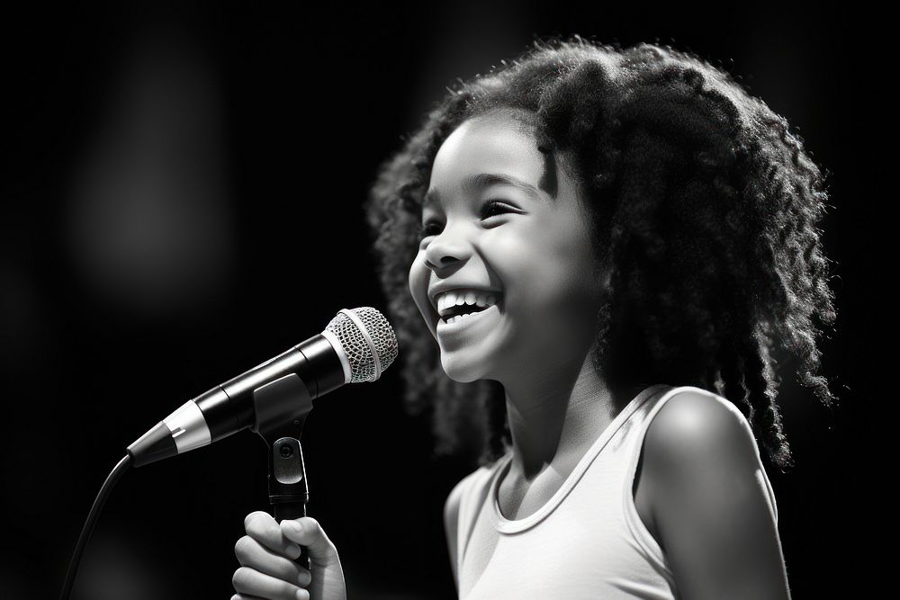 10 years old African American student girl speaker microphone portrait smiling. AI generated Image by rawpixel.