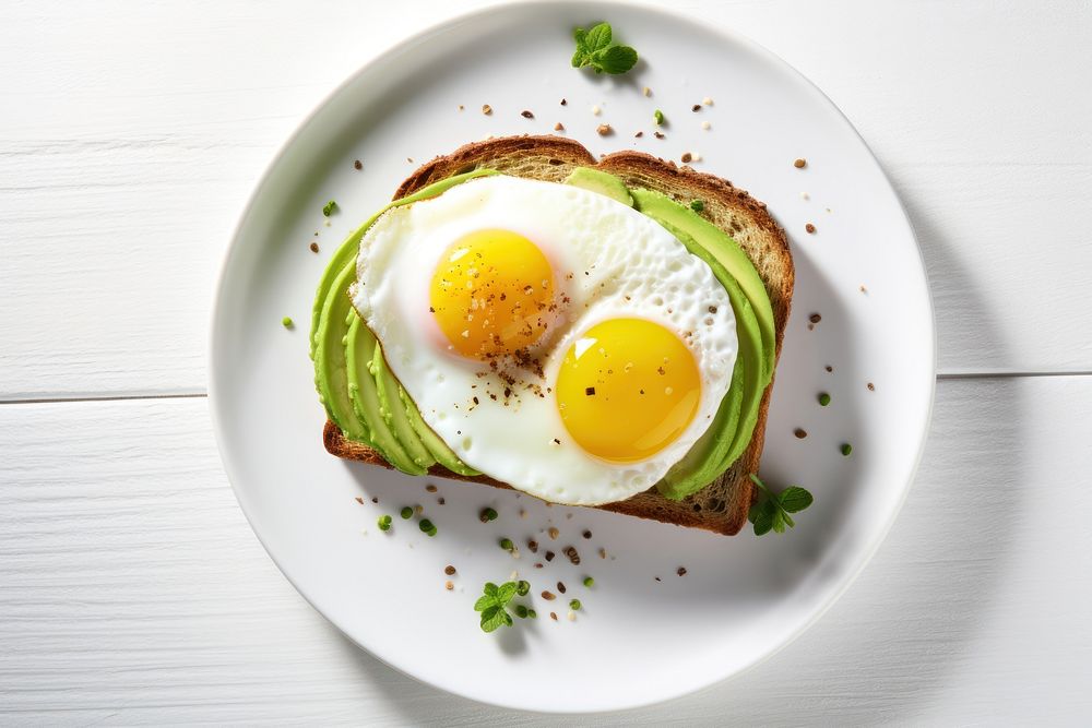 Avocado toast egg plate table. AI generated Image by rawpixel.