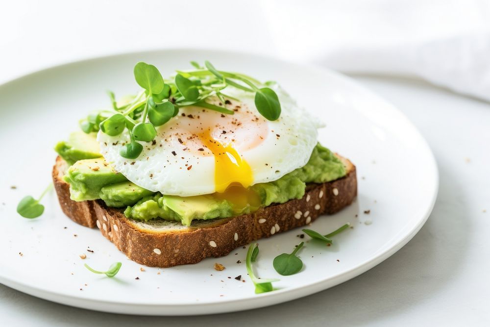 Avocado toast egg bread plate. AI generated Image by rawpixel.