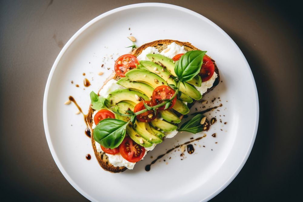 Avocado toast plate tomato food. 