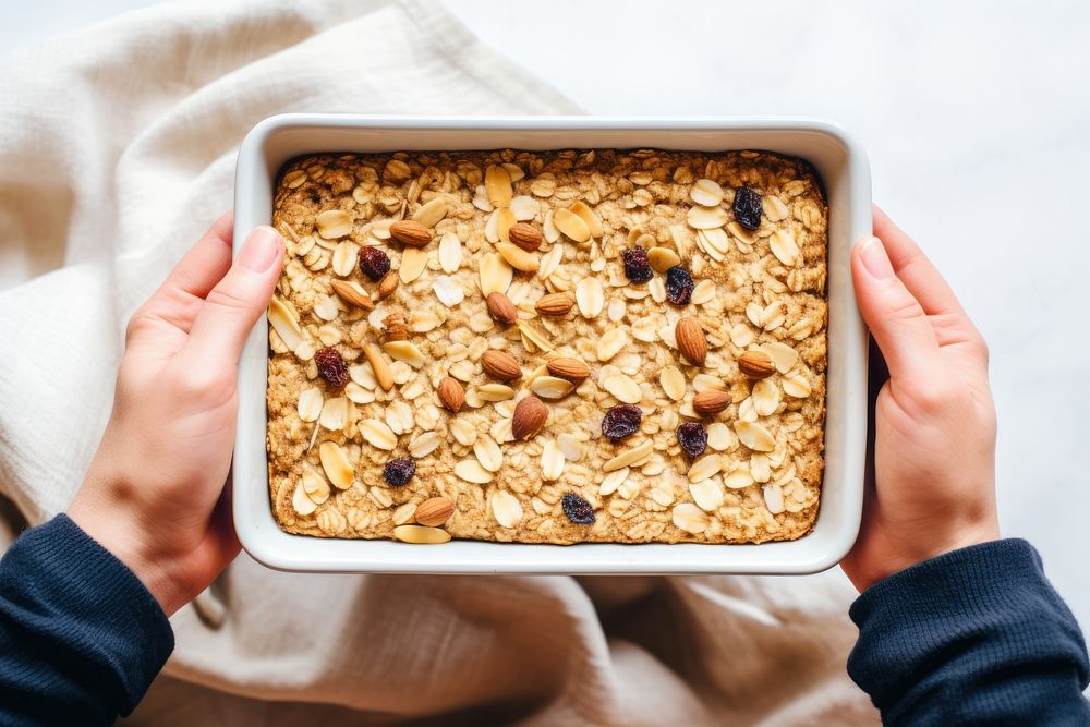 Baked oatmeal holding food bowl. AI generated Image by rawpixel.