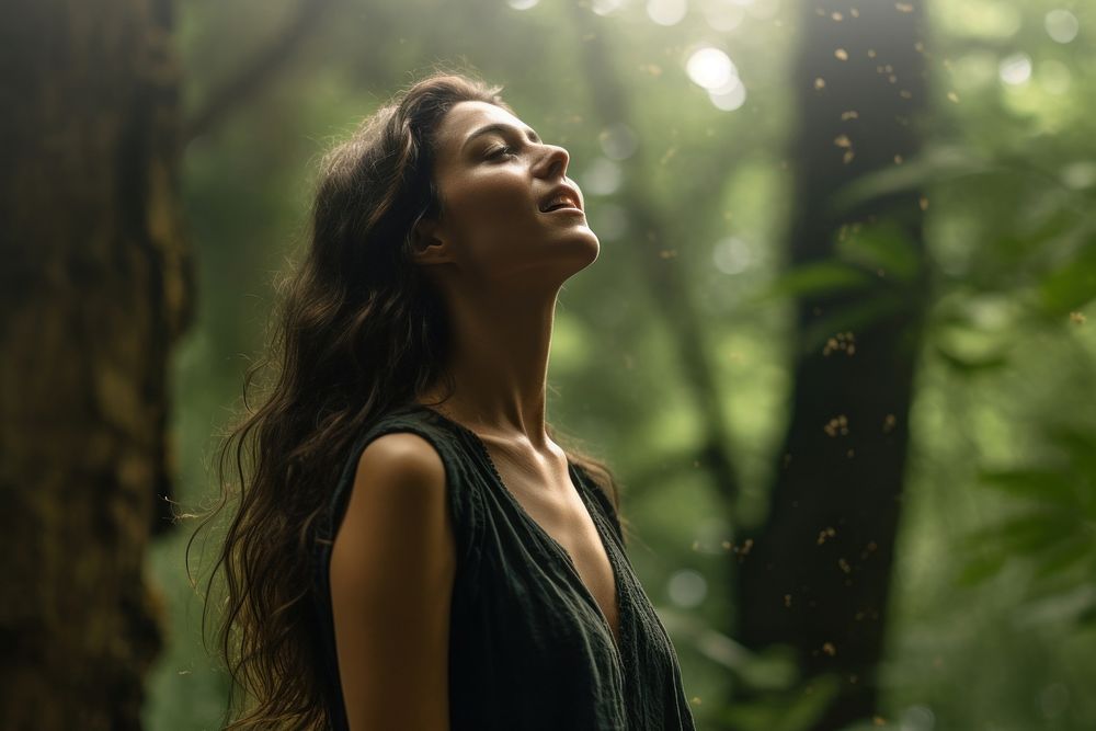 Woman smelling the air in the forest photography portrait plant. AI generated Image by rawpixel.