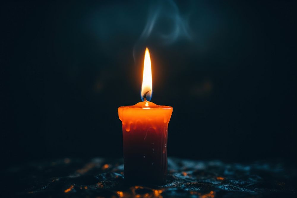 Candle close up darkroom spirituality illuminated. AI generated Image by rawpixel.