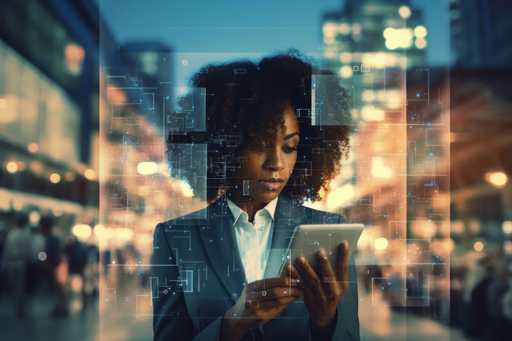Black business woman holding tablet on modern cities computer portrait adult. AI generated Image by rawpixel.