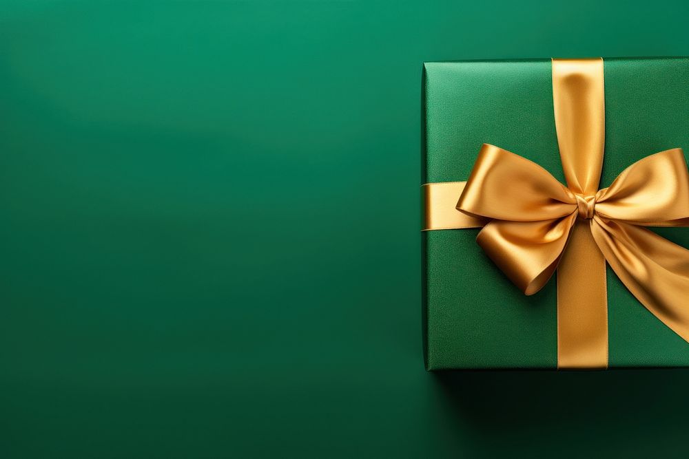 Green gift box backgrounds gold bow. AI generated Image by rawpixel.