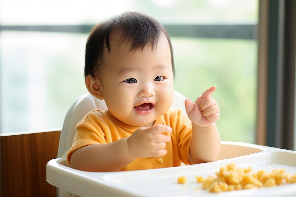 Eat baby food innocence happiness babyhood. AI generated Image by rawpixel.