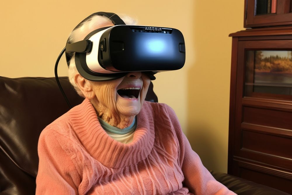 Granny wear vrheadset in gaming room photo photography technology. AI generated Image by rawpixel.