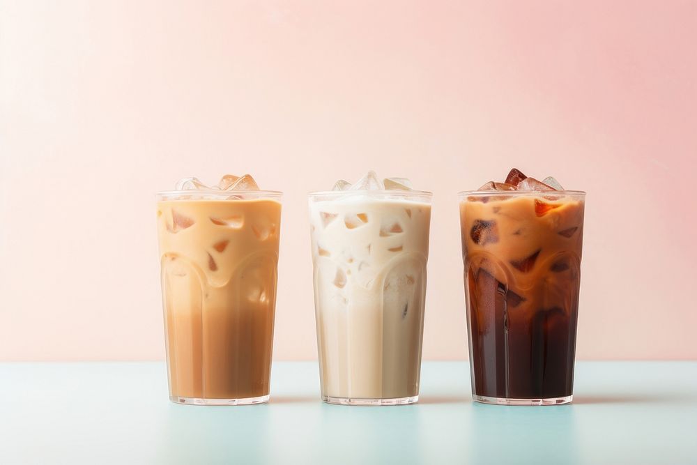 2 iced coffee drink milk refreshment. AI generated Image by rawpixel.