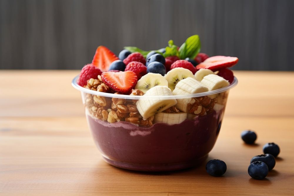 Acai bowl granola food strawberry. AI generated Image by rawpixel.