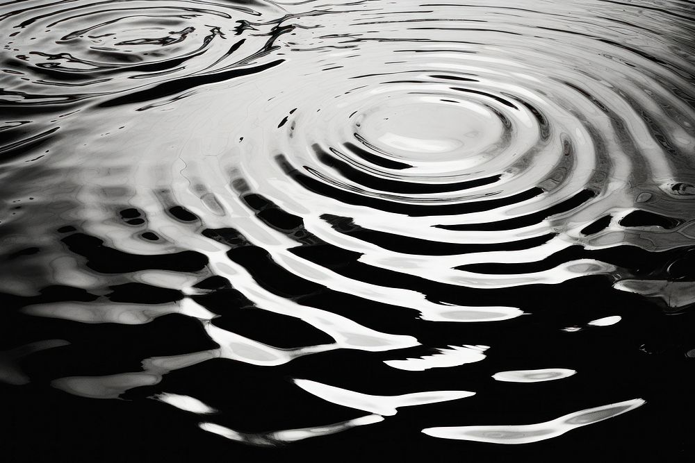 Ripples on water surface outdoors black white. AI generated Image by rawpixel.