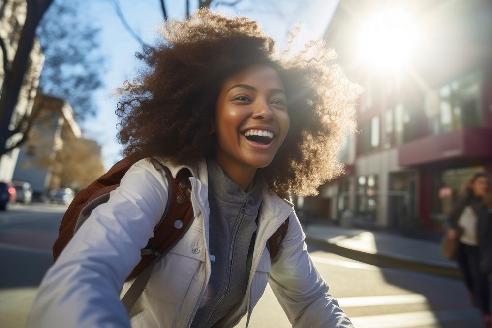 Happy African American female student cycling laughing street adult. AI generated Image by rawpixel.