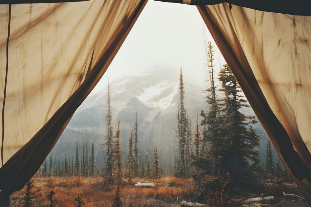 The inside of a tent with a view of the mountain in Canada outdoors camping nature. AI generated Image by rawpixel.