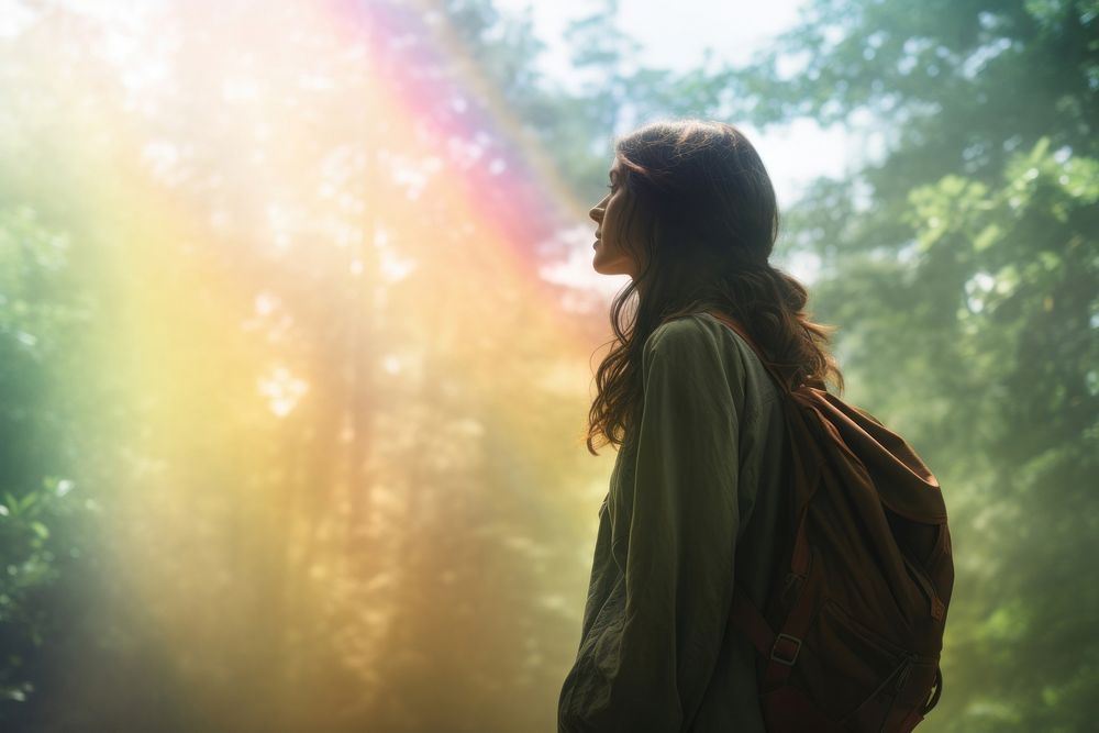 A woman with a backpack take a breath sunlight portrait outdoors. AI generated Image by rawpixel.
