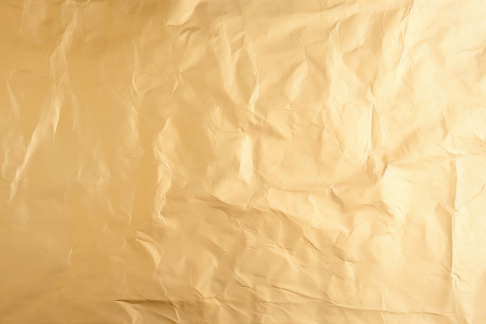An old pastel gold paper backgrounds wrinkled texture. AI generated Image by rawpixel.