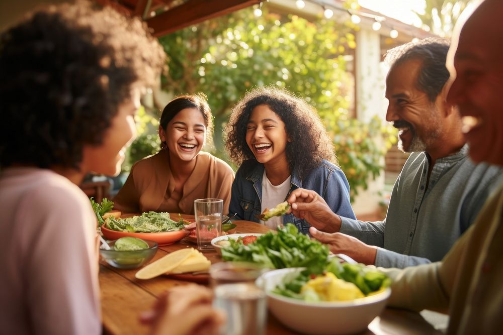 Hispanic family laughing lunch adult. AI generated Image by rawpixel.