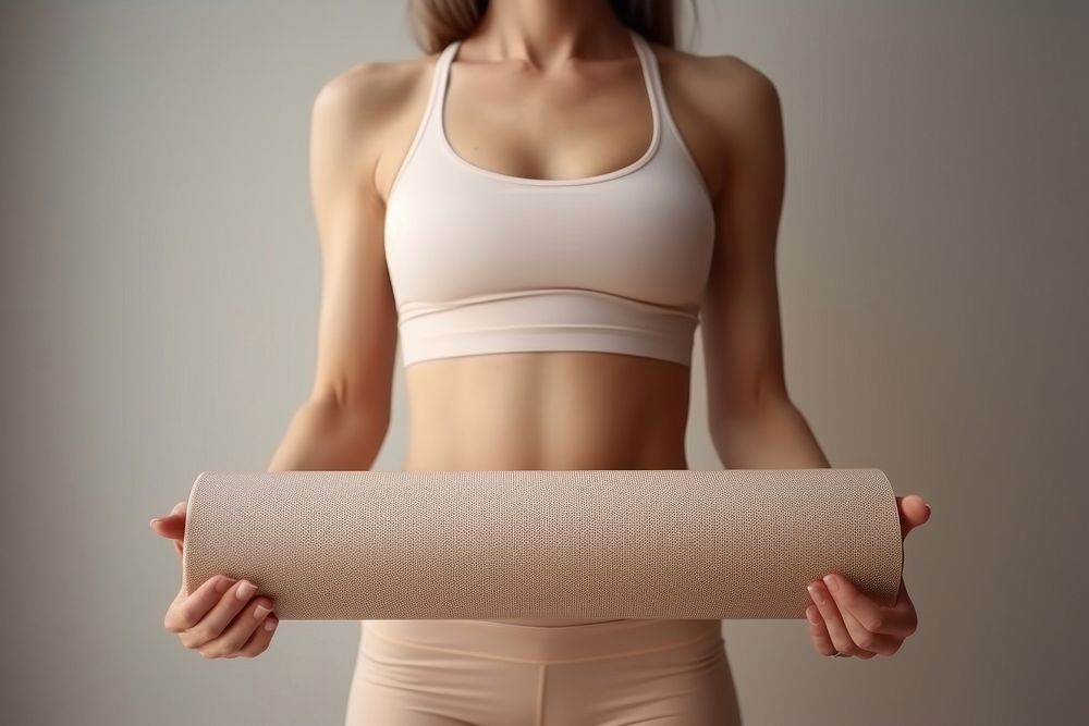 Happy woman wearing sportswear practice yoga mat undergarment flexibility accessories. 