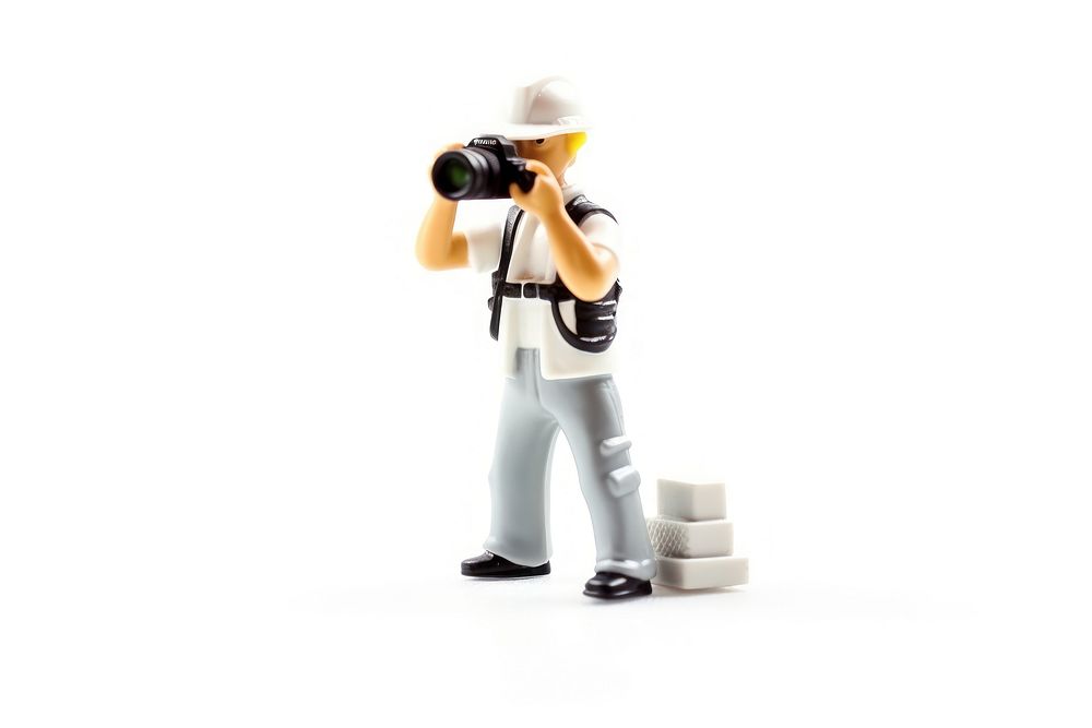 Photographer figurine white background photography. AI generated Image by rawpixel.