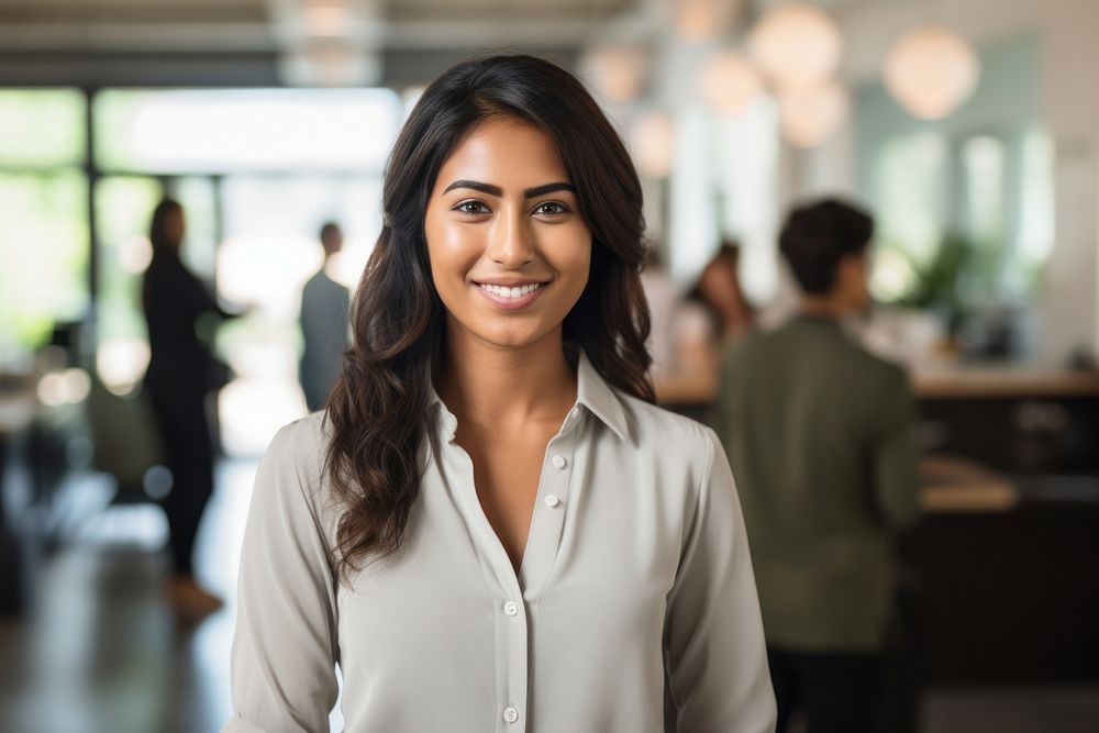 Mixed south asian woman standing smiling adult smile entrepreneur. AI generated Image by rawpixel.