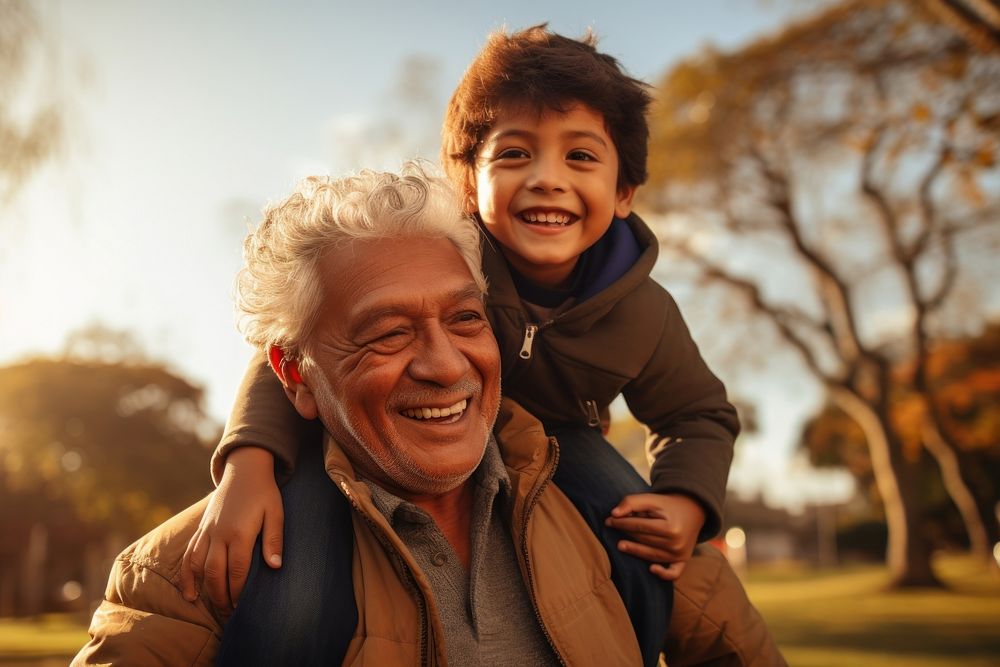 Hispanic family grandfather laughing portrait. AI generated Image by rawpixel.