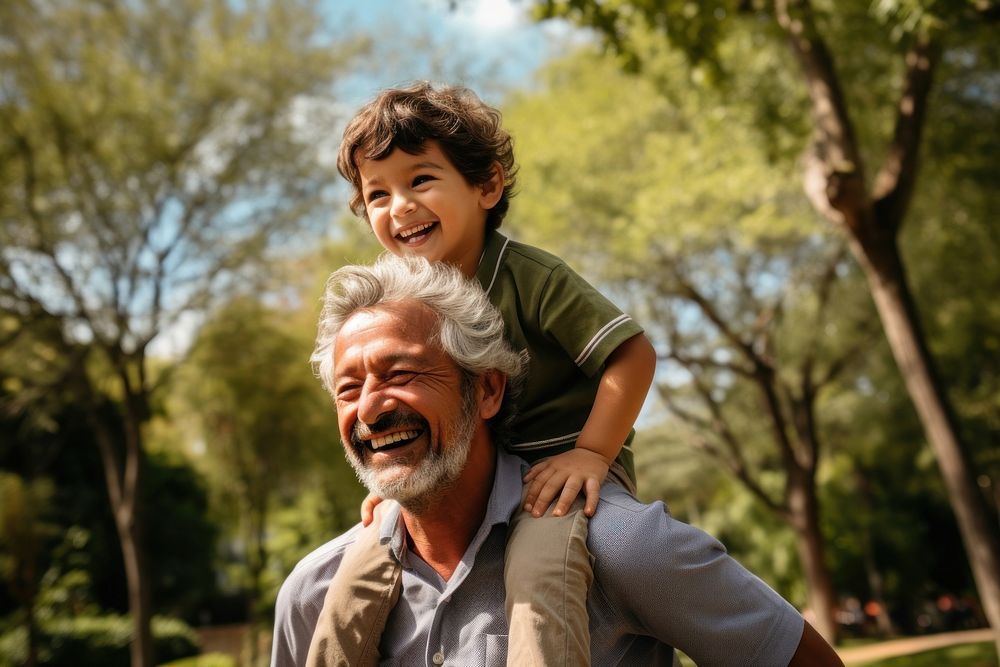 Hispanic family grandfather laughing portrait. 