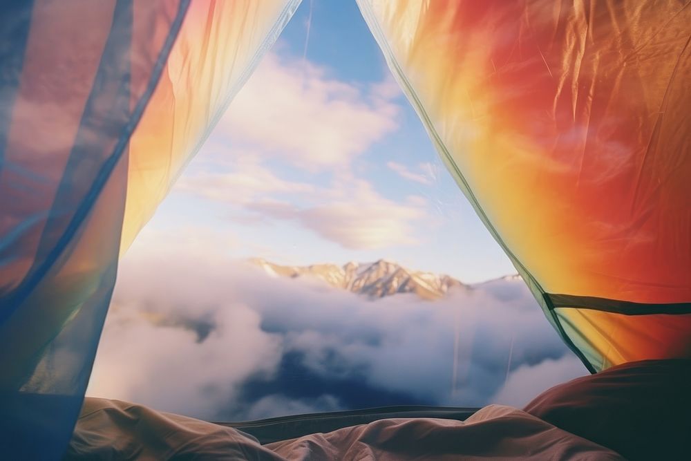 The inside of a tent with a view of the mountain landscape outdoors camping. AI generated Image by rawpixel.