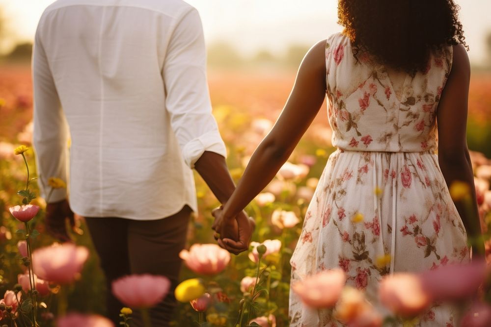 A black couple hand walking flower. AI generated Image by rawpixel.