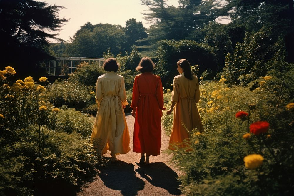 3 women walking in a big garden outdoors fashion nature. AI generated Image by rawpixel.